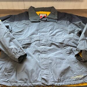 vintage Burton technical jacket featuring a gray and black exterior with yellow